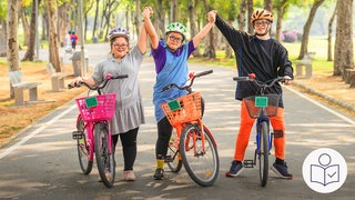 Zwei Frauen und ein Mann stehen auf einem Fahrrad·weg mit ihren Fahrrädern. Alle haben das Down-Syndrom. Alle lachen und halten sich an den Händen. Rechts das SWR Logo für Leichte Sprache.