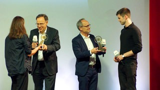 Übergabe des geteilten Hauptpreises