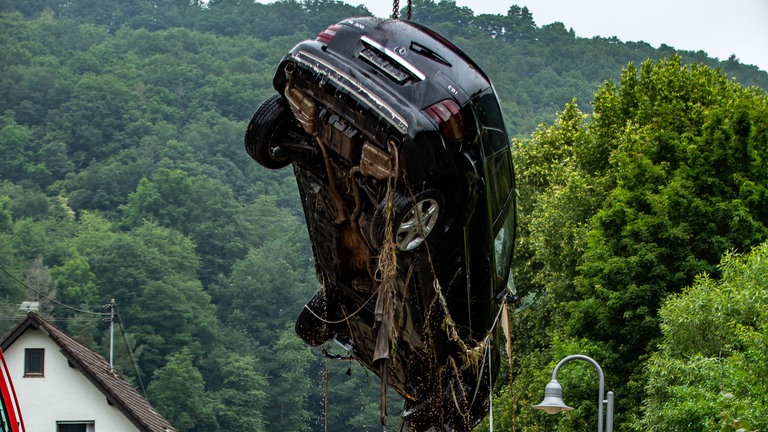 Schweizer hilt in Schuld bei Autos abschleppen.