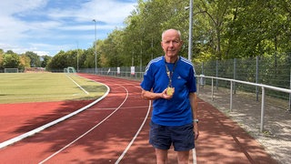 Goldmedaille mit 80