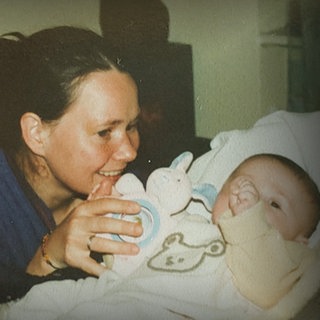 Junge Mutte mit ihrem Baby