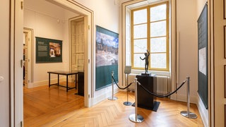 Blick in die Sonderausstellung „Sehnsucht Pompeji“ auf Schloss Villa Ludwigshöhe