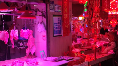 Ein Markstand in der Hafenstadt Guangzhou in China