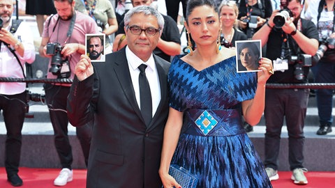 Kino als Protest: Mohammad Rasoulof und Schauspielerin Golshifteh Farahani bei der Vorführung von „The Seed Of The Sacred Fig“ in Cannes, 2024.