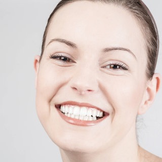 Lachende Frau. Symbolfoto.