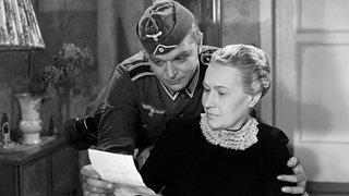 Gustav Fröhlich und Hildegard Grethe in 'Sechs Tage Heimaturlaub', Regie: Jürgen von Alten, 1941.