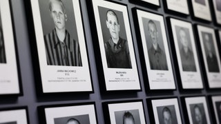 Portraits of prisoners are seen at the former Nazi German concentration camp Auschwitz-Brikenau
