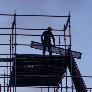 Gerüstbauer bei der Arbeit