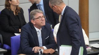 Kulturstaatsminister Wolfram Weimer während einer Haushaltsdebatte mit Bundeskanzler Friedrich Merz, September 2025 im Bundestag