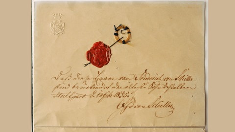 Haarlocke Schillers mit Echtheitszertifikat seines ältesten Sohne Carl (1855)