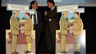 Die Autoren André Juillard (links) und Yves Sente (rechts) 2003 in Brüssel, bei der Vorstellung der Comic-Reihe „Blake & Mortimer“