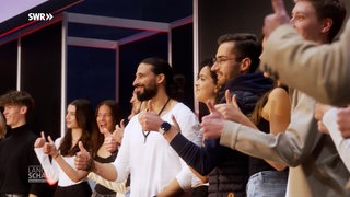 Menschen beim Casting einer Modelagentur