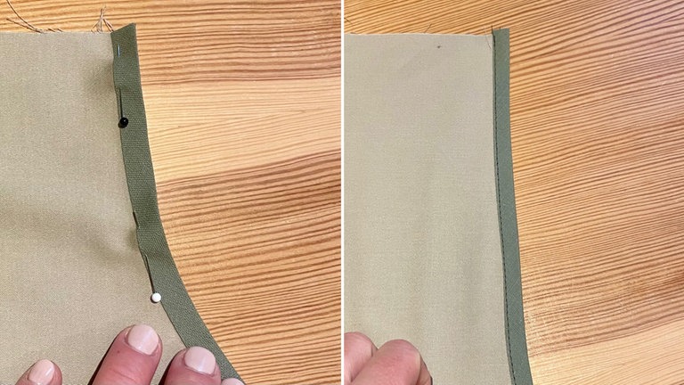 Schrägband an die runden Schnittkanten anbringen. Die überstehende Seite liegt unten, das Band um die Schnittkante legen und mit Stecknadeln fixieren. Anschließend mit Geradstich schmalkantig festnähen.