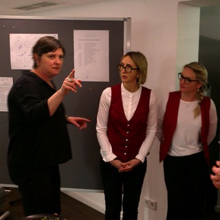 Besprechung eines Catering-Teams