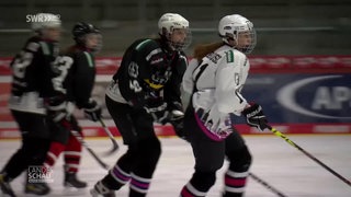 Eishochey Spielerinnen in Ausrüstung