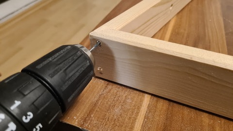 Holztannenbaum mit Rahmen