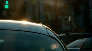 Autodach in der Sonne, tags: Geruch Neuwagen Sommer giftige Werte