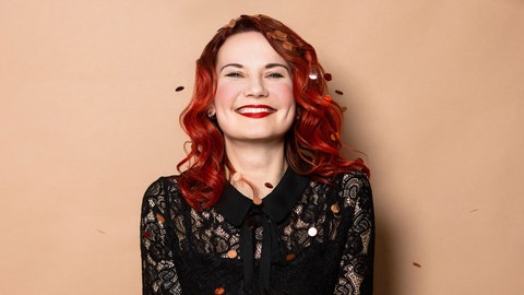 Dr. Sarah Straub ist Liedermacherin und Neuropsychologin.