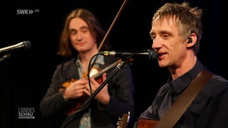 Musiker Andrew Cadie und Mark Bloomer