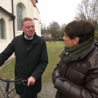 Sonja Faber-Schrecklein mit Pfarrer Julian