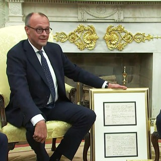 Friedrich Merz mit Donald Trump.