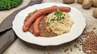 Linsen mit Spätzle und Würstchen