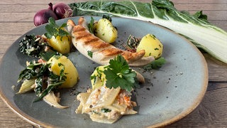 Mangold in Sahnesoße mit Bratwürstchen