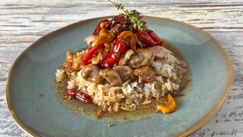 Marinierte Hähnchenkeulen mit Reis