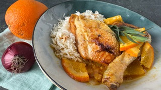 Geschmortes Hühnchen mit Orangen und Mandelreis