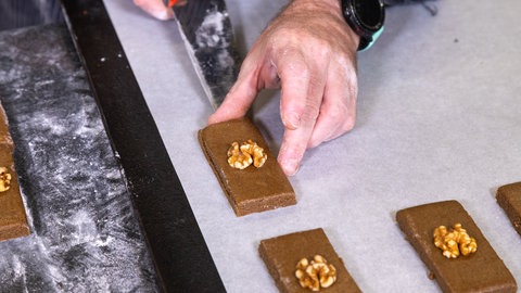 Printen werden auf das Backblech gelegt.