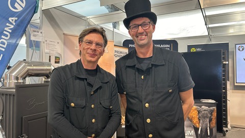 Freunde seit Schulzeiten, jetzt beide Schornsteinfeger