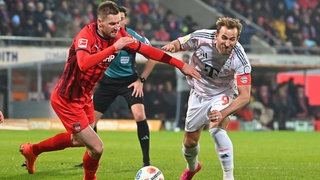 Patrick Mainka im Duell mit Harry Kane