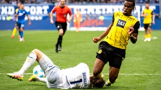 Baumann nach Kopverletzung über Schiedsrichterentscheidung.