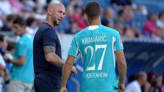 TSG-Trainer Christian Ilzer am Spielfeldrand mit Andrej Kramraic 