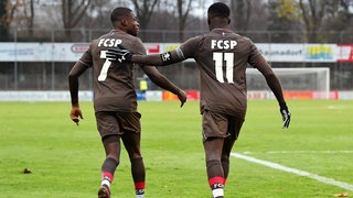 Christian und Sirlord Conteh im Trikot des FC St. Pauli