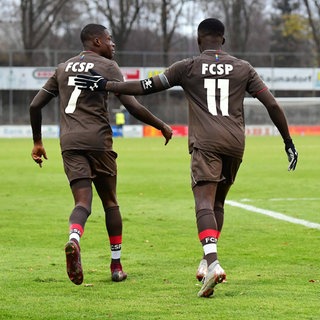 Christian und Sirlord Conteh im Trikot des FC St. Pauli