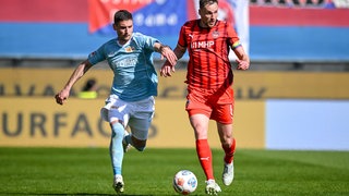 Andrej Ilić (li., 1. FC Union Berlin) in Aktion gegen Patrick Mainka (1. FC Heidenheim 1846)