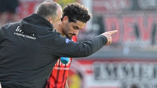 Frank Schmidt (li.) mit Eren Dinkci