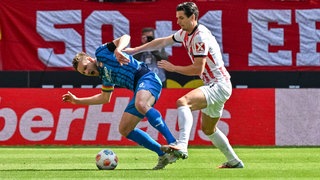 Patrick Mainka und Igor Matanovic im Zweikampf. 