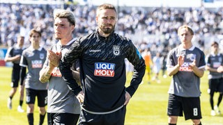 Enttäuschte Ulmer Spieler nach der Niederlage gegen den TSV 1860 München