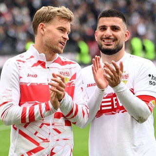 Dennis Undav und Maximilian Mittelstädt klatschen den Fans nach dem Spiel zu