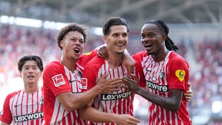 Spieler des SC Freiburg jubeln