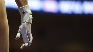Bandagierte Hand einer Turnerin