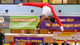 Turner vom KTV Koblenz am Barren