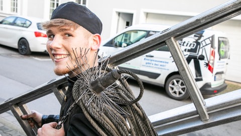 Junger Schornsteinfeger