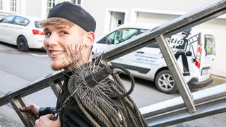 Junger Schornsteinfeger