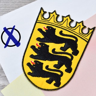 Hier findet ihr alles, was ihr rund um die Kommunalwahl in Baden-Württemberg wissen müsst. Das Bild zeigt das Wappen von Baden-Württemberg auf einem stilisierten Wahlzettel
