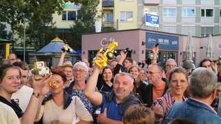 OK, wir geben uns geschlagen: Spielzeug-Traktoren, wohin man schaut. Frankenthal hat weit mehr als 50 Fahrzeuge in Miniaturgröße auf den Rathausplatz gebracht und somit die Stadtwette gewonnen!