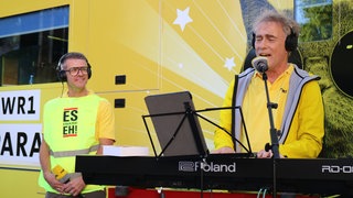 Hanns Lohmann singt für Frank Jenschar bei der SWR1 Hitparade 2026. Frank erträgt es mit Würde.