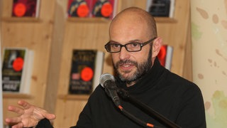 Politiker Marco Bülow bei einer Lesung zu seinem Buch "Lobbyland" 2023.